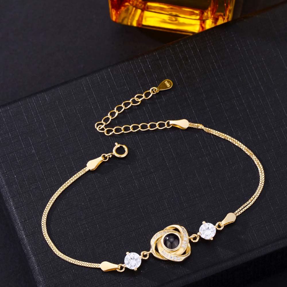 Foto Projektion Armband mit Bild im Stein - Rotierende Dreiblättrige Blume